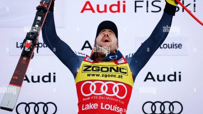 norways-aleksander-aamodt-kilde-celebrates-his-victory-on-the-podium-following-the-mens-world-cup-downhill-ski-race-at-lake-louise-alta-saturday-nov-26-2022-the-canadian-pressjeff-mcintosh-2KMW2CM
